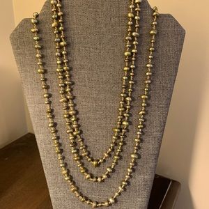 String of pistachio green colored cultured pearls by Honora.